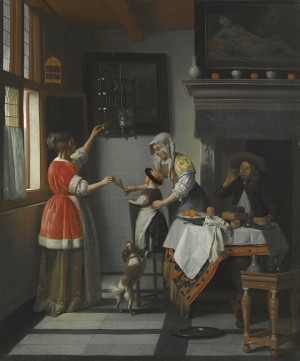 Interior with a child feeding a parrot